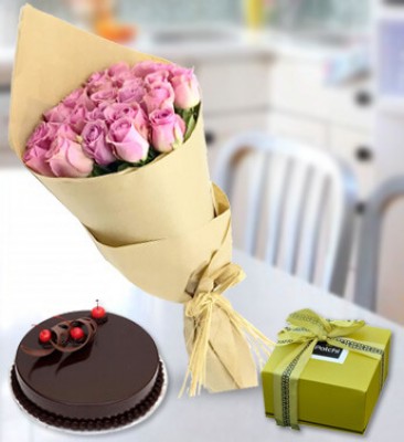 Bunch of 20 Pink Roses in a brown paper with 1 Kg Cake and 250 gms Patchi Chocolate Everlasting Pink