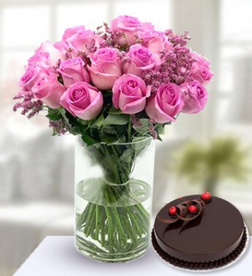 Bunch of 15 Pink roses with fillers and 1 kg Chocolate Cake Pinkness Combo