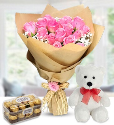 Bunch of 15 Pink roses with Fillers , 16 pcs Ferrero Rocher Chocolate and Small Teddy bear Stunning Delightful