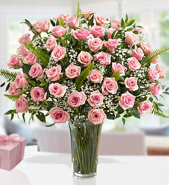 36 Stem of Pink Roses with fillers In a Glass Vase. (one sided Round arrangement) Amazing Pink
