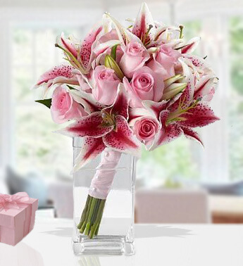 4 stems of Pink Lilies & 6 Stems of Pink Roses in a Glass Vase (as Image) Pleasantly Pink