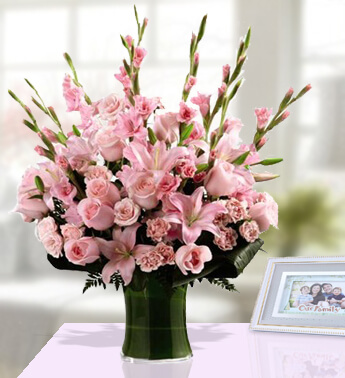 5 Stems Of Pink Lilies , 10 Stems Of Pink Gladioli , 10 Stems Of Pink Roses & 10 Stems Of Pink Carnations in a Glass Vase (One sided arrangement) Pink Pink Beauty