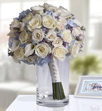40 White Roses in a Glass Vase with Blue Ribbons in Centre (As Image) White Lace