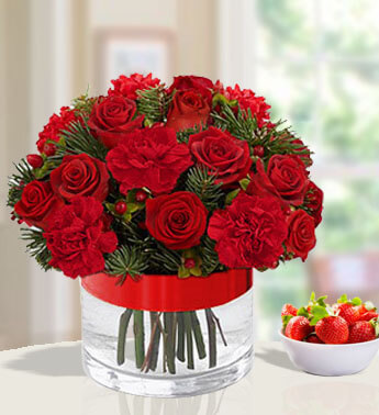 Arrangement of 8 red roses and 8 red carnations in a glass vase Color of Love