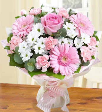 Bunch of 4 stems of White Chrysanthemum, 3 stems of Pink Gerbera, 1 stems of Pink Rose in nice wrapping Favorite Pink