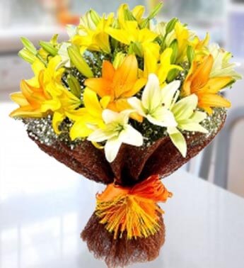 Bunch of 3 stems of white lilies , 3 stems of orange lilies & 3 stems of Yellow lilies in nice wrapping Perfect Lilies