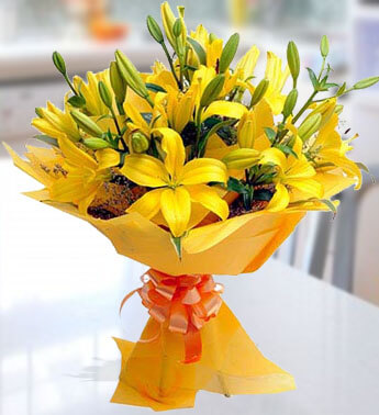 Bunch of 10 steams of yellow lilies in nice wrapping Lily Sunshine