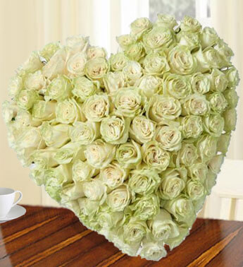 Heart shape arrangement of 60 White Roses. Heartfelt Roses