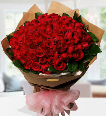 Bunch of 100 Red roses with green fillers in a nice wrapping paper. Romance Roses