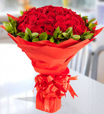 Bunch of 60 Red Roses with fillers in a nice wrapping. Sweet Surprise