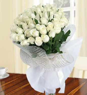 Bunch of 40 White Roses in a nice white wrapping. Cool Heather