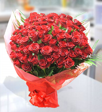Bunch of 75 Red Roses in a nice wrapping. Reddish