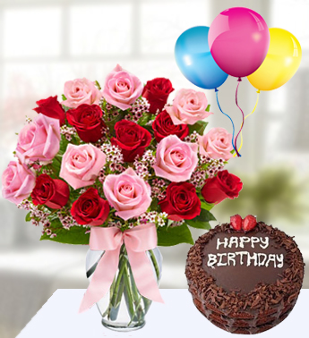 9 Pink and 9 Red Roses with fillers in a Glass vase (one sided round arrangement) with 1 Kg Chocolate Cake and 3 Latex Balloon Say It With Roses and Cake