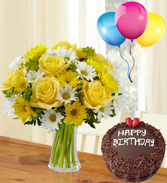 Bunch of 8 Stems of Yellow Roses,3 Stems Of White Chrysanthemum & 3 Stems Of Yellow Chrysanthemum with fillers with 1 Kg Chocolate Cake and 3 Latex Balloon Sunshine Surprise