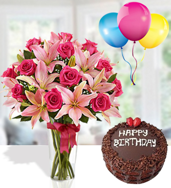 6 stems of Pink Lily, 14 Pink Rose with fillers in a glass vase (one sided round arrangement) with 1 Kg chocolate cake and 3 Latex Balloon Magnificient Birthday Combo