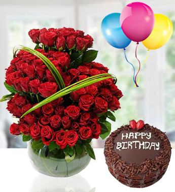 100 Red Roses in a Glass vase (as image) with 1 Kg chocolate Cake and 3 Latex Balloon Red Beauty Combo