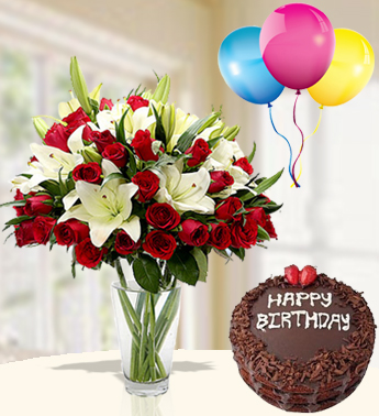 Bunch of 5 stems of White Lilies and 20 Red Roses with 1 Kg Chocolate Cake and 3 Latex Balloon Memorable Moments with Cake