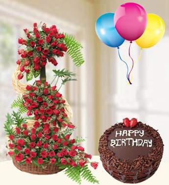 3 feet stand arrangement of 100 Roses with fillers in a basket with 1 Kg Chocolate Cake and 3 Latex Balloon Height Of Love Combo