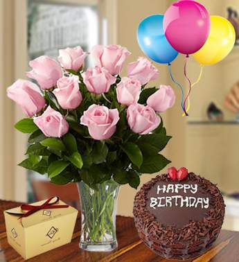 12 Pink Roses in a Glass vase with 1 Kg Chocolate Cake , 3 Latex Balloon and 260 Gms Choco Chocolate Grasefull Choco Combo
