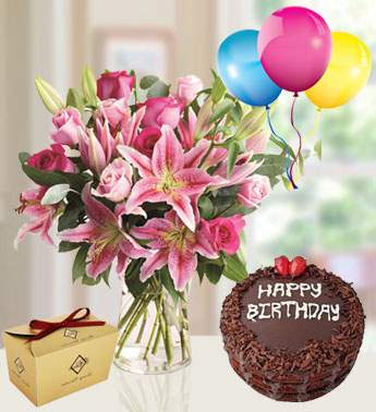 Bunch of 5 stems of Pink Lilies , 12 Pink Rose with filler , 250 gms Of Choco Chocolate , 1 Kg Chocolate Cake and 3 Latex Balloon Passionate Pink Combo
